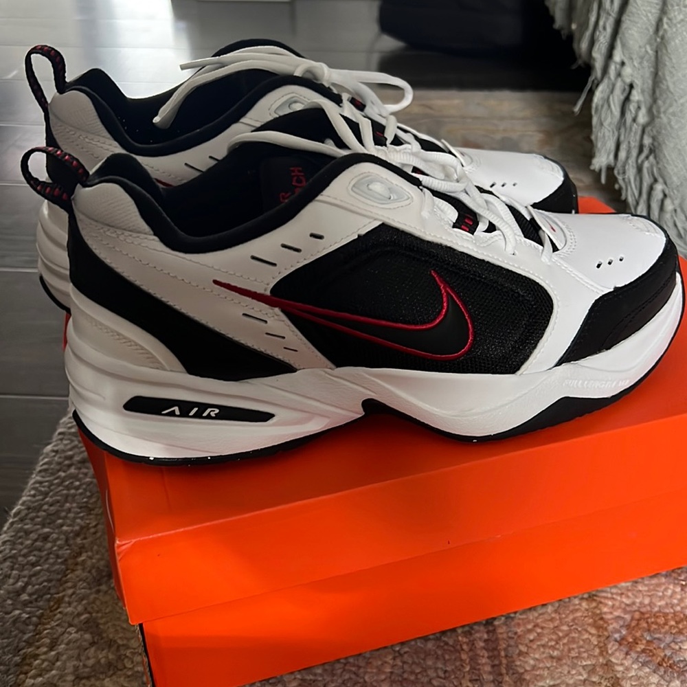 Brand new Nike Air Monarch IV Black white and red accents